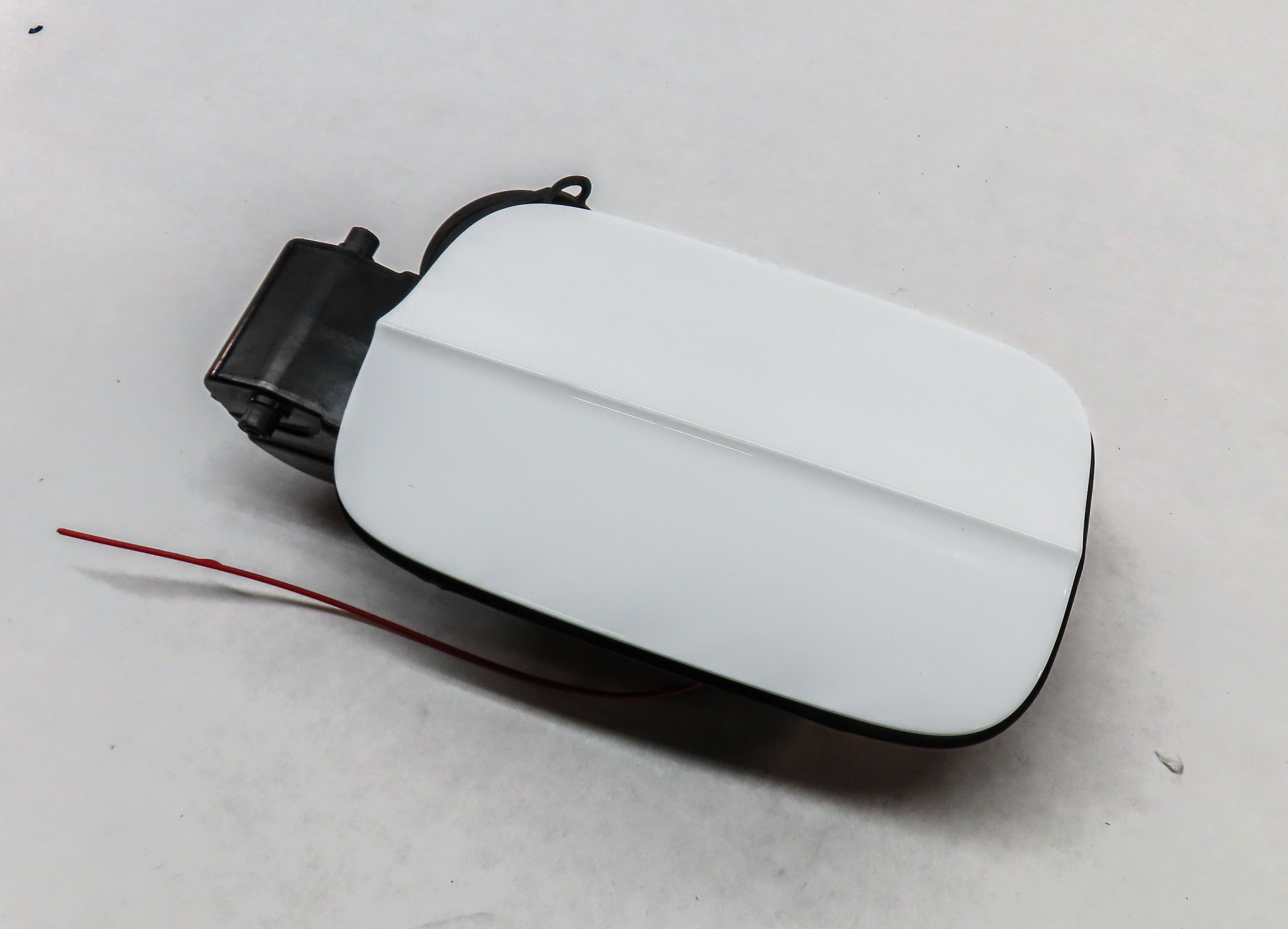 2016-2018 AUDI A3 (8V) FUEL TANK FILL DOOR LID COVER w/ HOUSING (WHITE) — exact item pictured